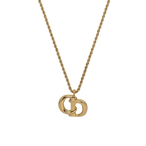 gold dior logo|gold dior necklace.